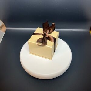 Incredibly elegant Gold Ring  new in box with multi pear faced natural rubys!